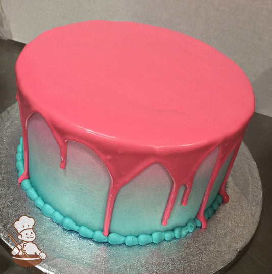 Round cake with Ombre aqua-blue airbrushed icing. The cake also has a hot pink drip on top pouring down on the cake walls.