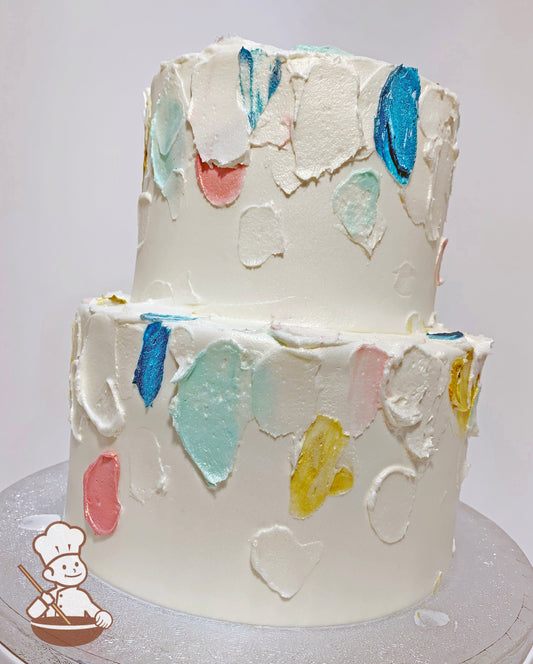 2 tier buttercream wedding cake with multi colored oil painting style buttercream patterns.
