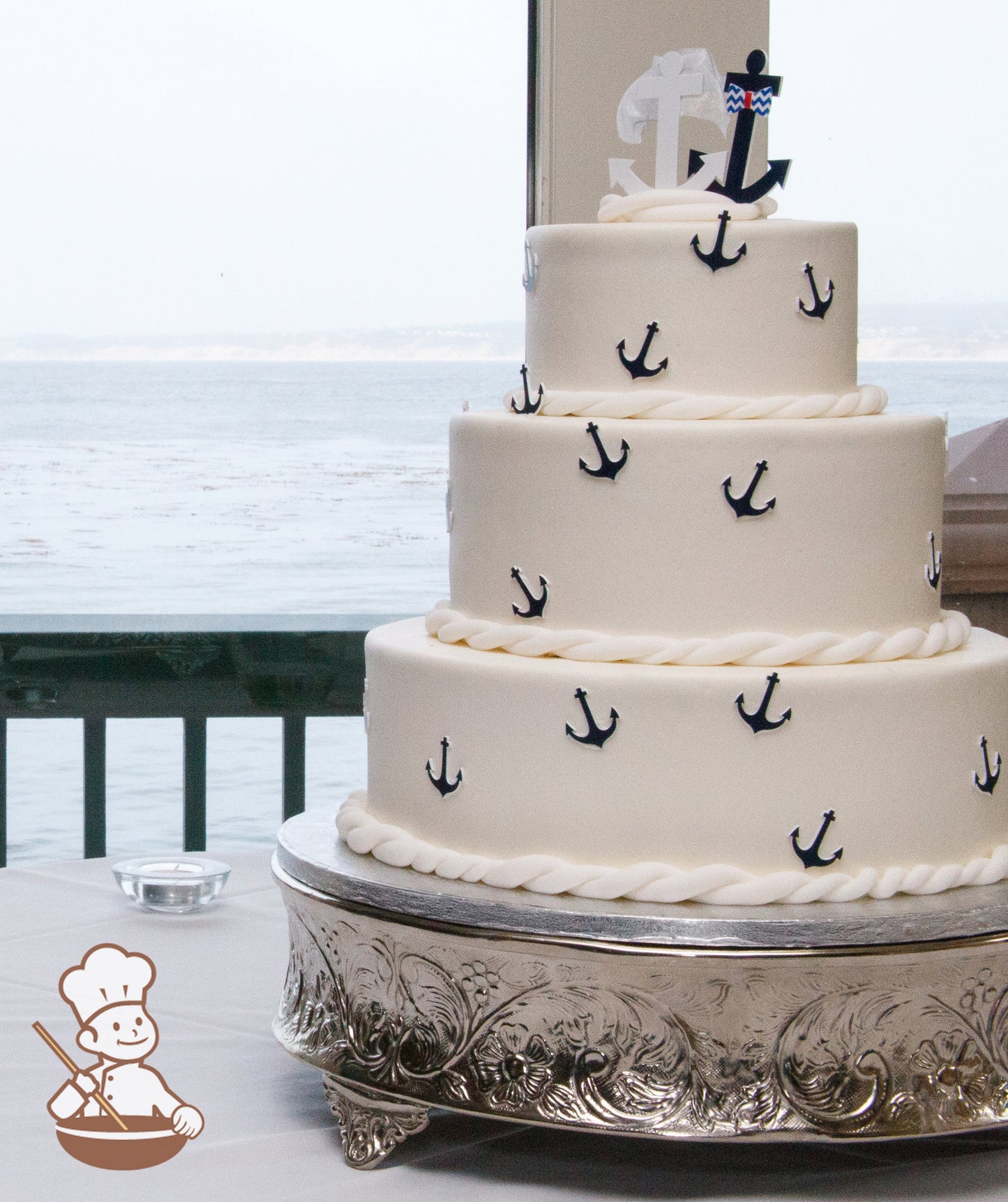 Nautical themed cake set against ocean background.