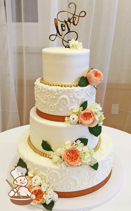 4-tier cake with white icing on all tiers and white scrolls on the bottom and third tier with a gold ribbon and gold glass beads on other tiers.