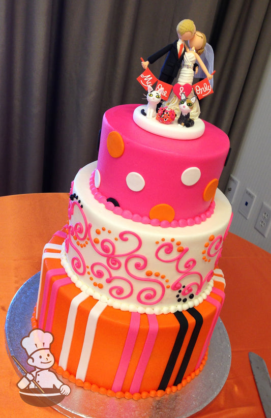 3 tier round cake with bright pink, orange, white and black decorations (polkadot, fondant stripes and buttercream pipings).