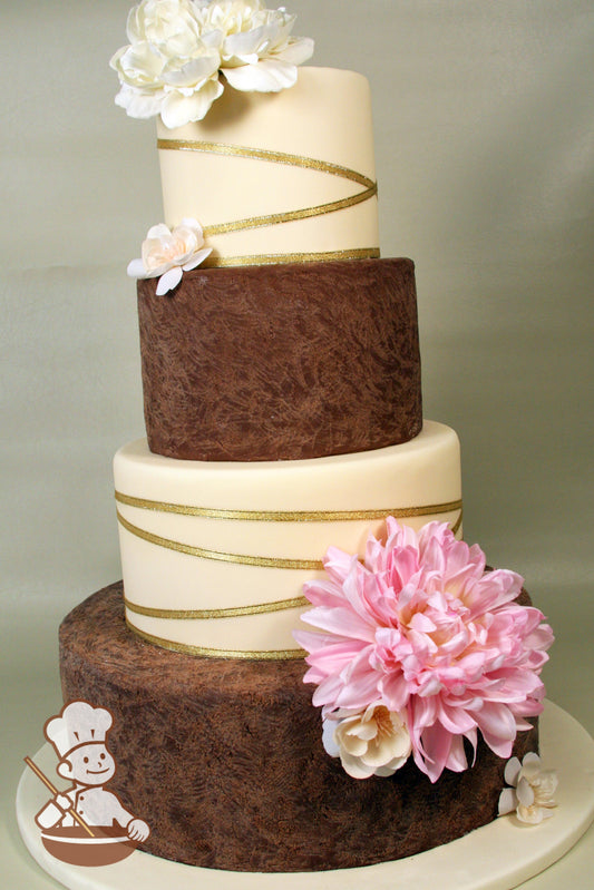 4 tier fondant wedding cake with alternating smoth ivory and textured chocolate brown tiers with gold ribbon accents.