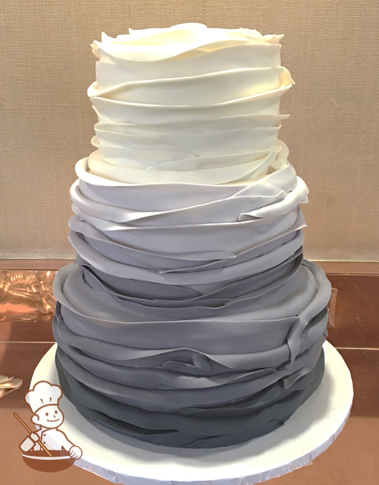 3 tier fondant wedding cake with gray to white ombre fondant petal wrap.
