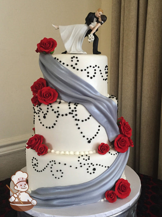3 tier fondant wedding cake with silver fondant drapes, black bead piping and red sugar roses.