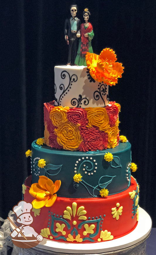 4-tier cake with colorful floral patterns and scrolls in bright red, orange, yellow and touch of dark teal. One tier has large rosette wrap. 