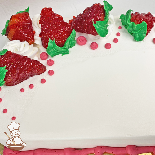 Sheet cake with fresh strawberries and whipped cream.
