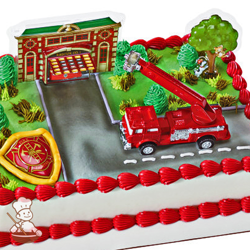 Birthday sheet cake with buttercream town and fire engine and fire house toy.