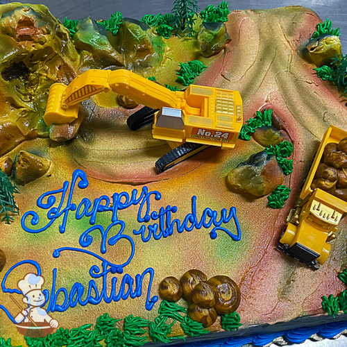 Birthday sheet cake with construction trucks and digger toy set on buttercream decoration of construction site.