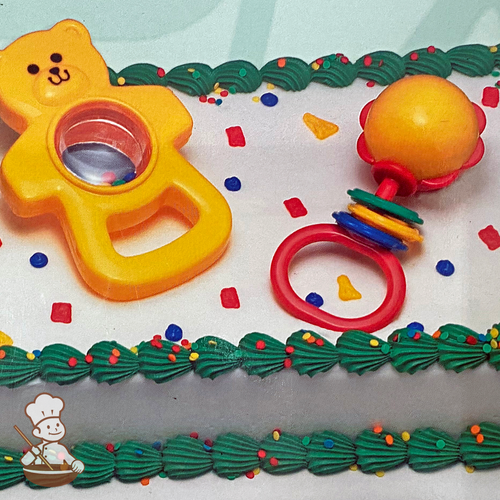 Birthday sheet cake with Baby rattle of bear and ball toy set.